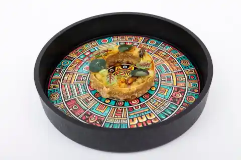 Imagen 1 de Un anillo de maíz relleno de lechazo gana el XXI concurso nacional de tapas